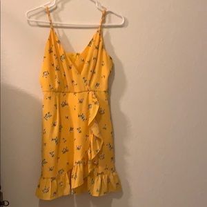 Mini yellow, floral wrap dress from Altr’d State